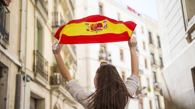 Frau mit spanischer Flagge
